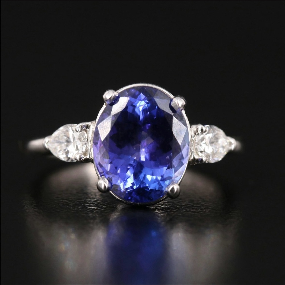 14K 3.40 CT Natural Tanzanite and Natural
Diamond Ring set in 14k white gold.